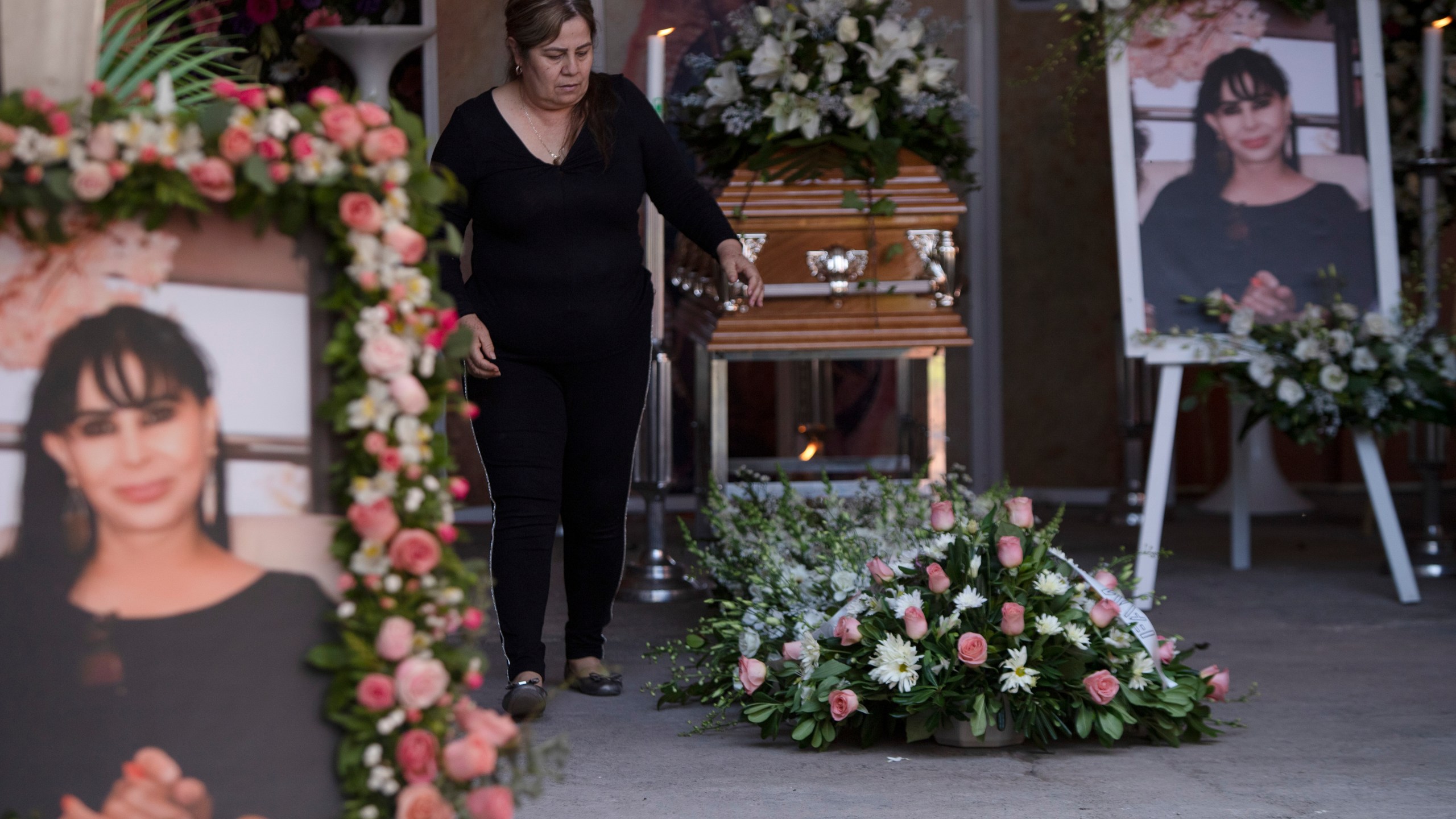 A woman attends the wake of mayoral candidate Alma Barragan in Moroleon, Mexico, on May 26, 2021. (Armando Solis / Associated Press)