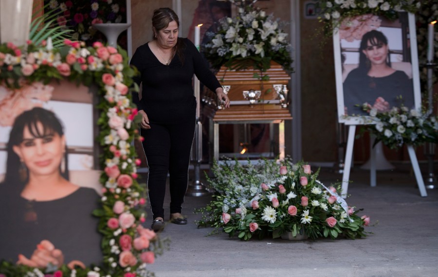 A woman attends the wake of mayoral candidate Alma Barragan in Moroleon, Mexico, on May 26, 2021. (Armando Solis / Associated Press)