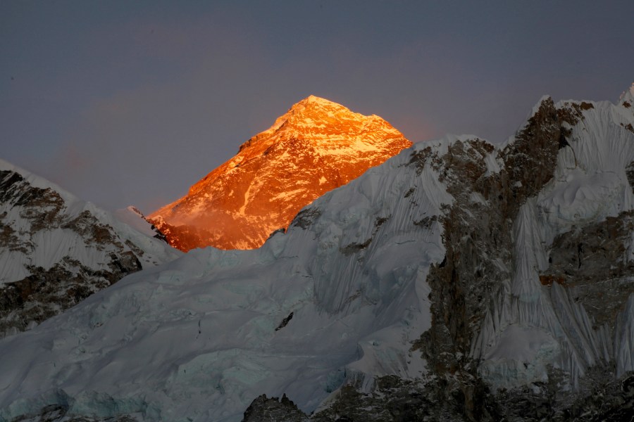 In this Nov. 12, 2015 file photo, Mount Everest is seen from the way to Kalapatthar in Nepal. A year after Mount Everest was closed to climbers as the pandemic swept across the globe, hundreds are making the final push to the summit with only a few more days left in the season, saying they are undeterred by a coronavirus outbreak in base camp. (AP Photo/Tashi Sherpa, File)