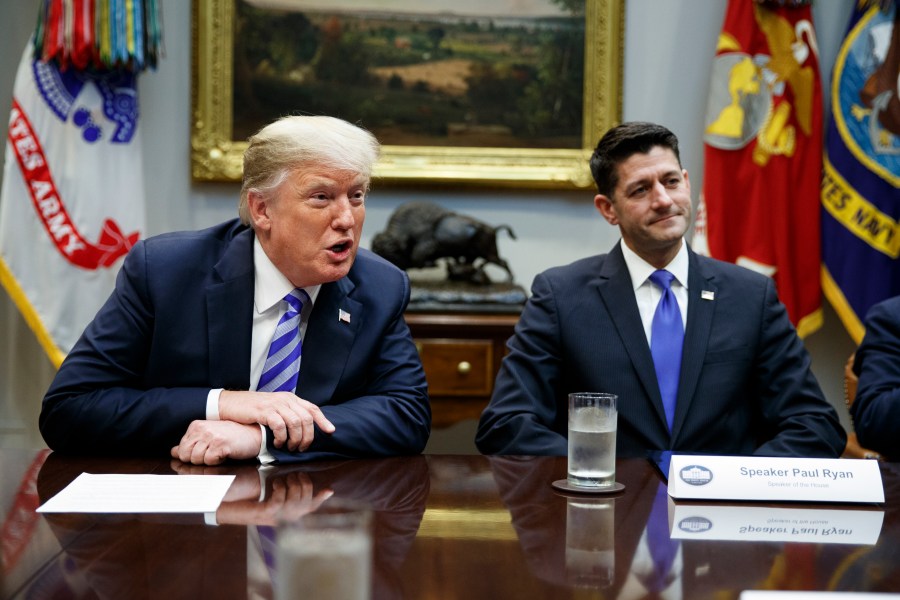 In this Sept. 5, 2018, file photo, then-Speaker of the House Paul Ryan, R-Wis., listens to President Donald Trump speak during a meeting with Republican lawmakers in the Roosevelt Room of the White House in Washington. (AP Photo/Evan Vucci, File)