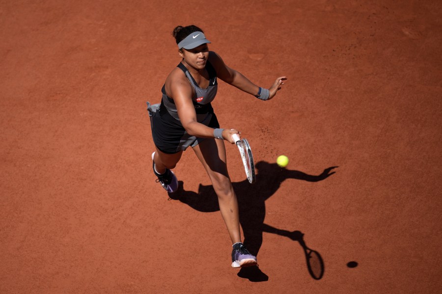 Japan's Naomi Osaka returns the ball to Romania's Patricia Maria Tig during their first round match at the Roland Garros stadium on May 30, 2021 in Paris. (Christophe Ena/Associated Press)