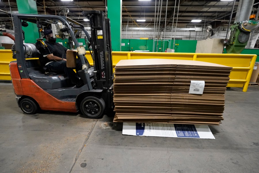 A forklift driver moves a pallet of cardboard boxes at Great Southern Industries, a packaging company in Jackson, Miss., says Friday, May 28, 2021. Charita McCarrol, human resources manager at the company, says that she has seen a lot of people abusing the $300-a-week federal supplement for people who lost their jobs during the COVID-19 pandemic, as well as other programs that offered extended support for the unemployed. She also cited the pool of needed certified and experienced forklift drivers and other positions are limited because of the said abuse. (AP Photo/Rogelio V. Solis)