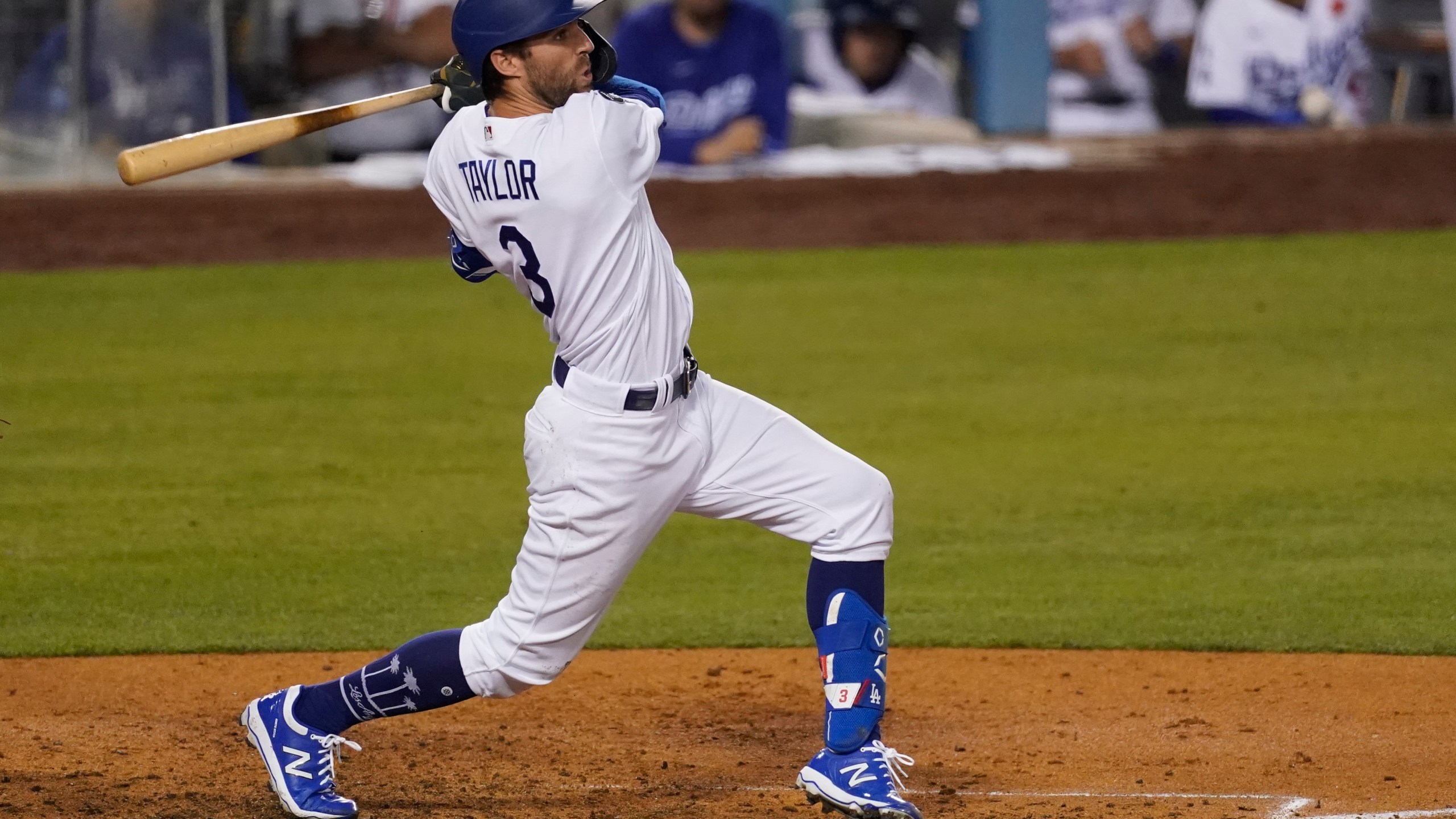 Los Angeles Dodgers' Chris Taylor (3) doubles during the sixth inning of a baseball game against the St. Louis Cardinals on May 31, 2021, in Los Angeles. (AP Photo/Ashley Landis)