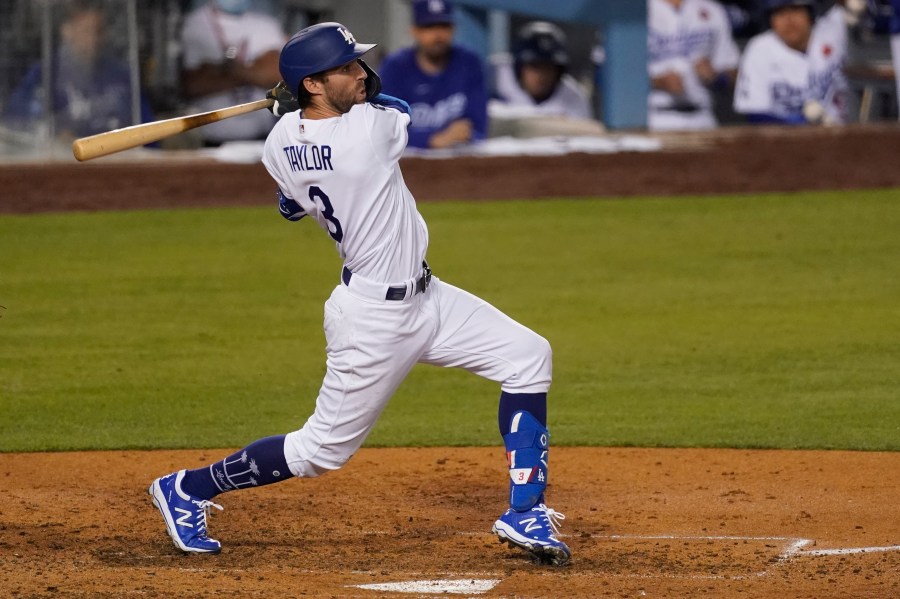 Los Angeles Dodgers' Chris Taylor (3) doubles during the sixth inning of a baseball game against the St. Louis Cardinals on May 31, 2021, in Los Angeles. (AP Photo/Ashley Landis)