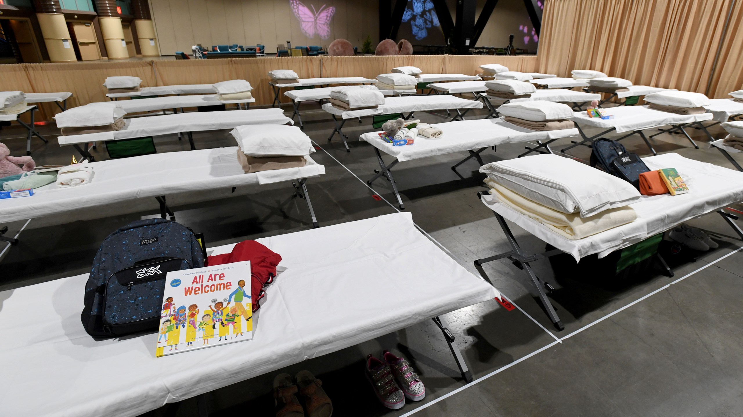 Sleeping quarters set up inside Exhibit Hall B for migrant children are shown during a tour of the Long Beach Convention Center on April 22, 2021. (Brittany Murray / Getty Images)