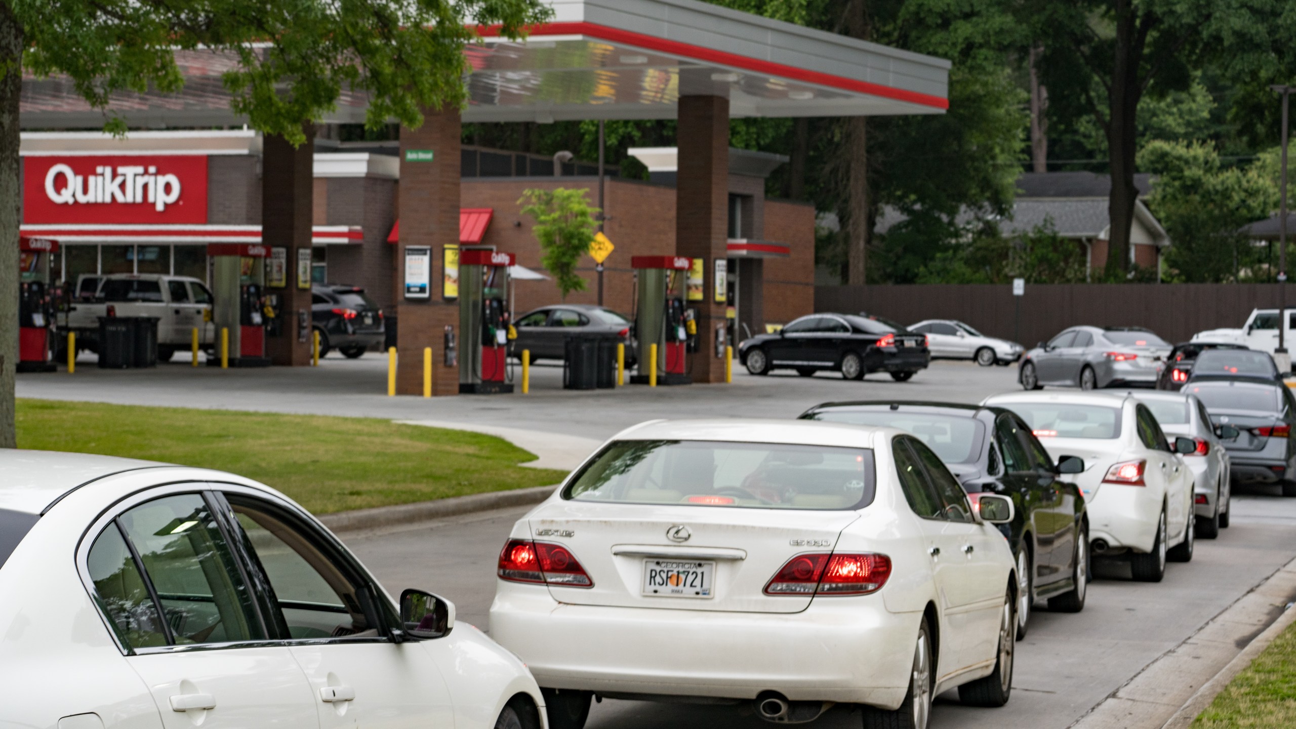 Cars line up at a QuickTrip gas station on May 11, 2021, in Atlanta, Ga. There is an expectation of a gasoline shortage in Georgia after Georgia-based gas company Colonial Pipeline reported a ransomware attack on May 7. (Megan Varner/Getty Images)