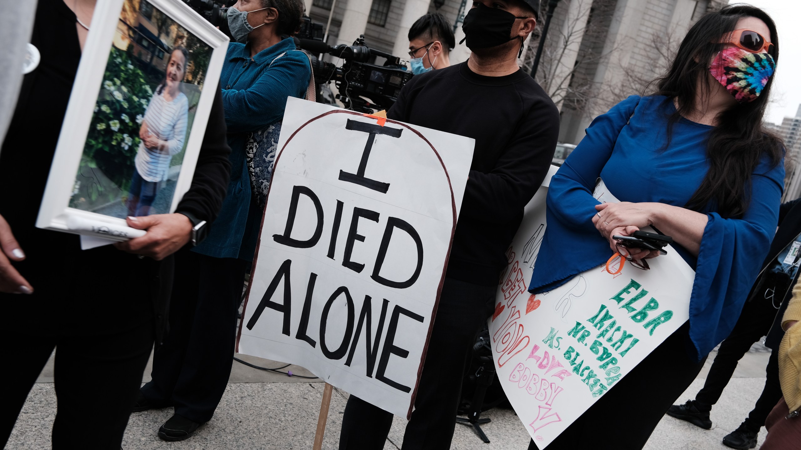 People who've lost loved ones due to COVID-19 while they were in New York nursing homes attend a protest and vigil on March 25, 2021 in New York City. ( Spencer Platt/Getty Images)