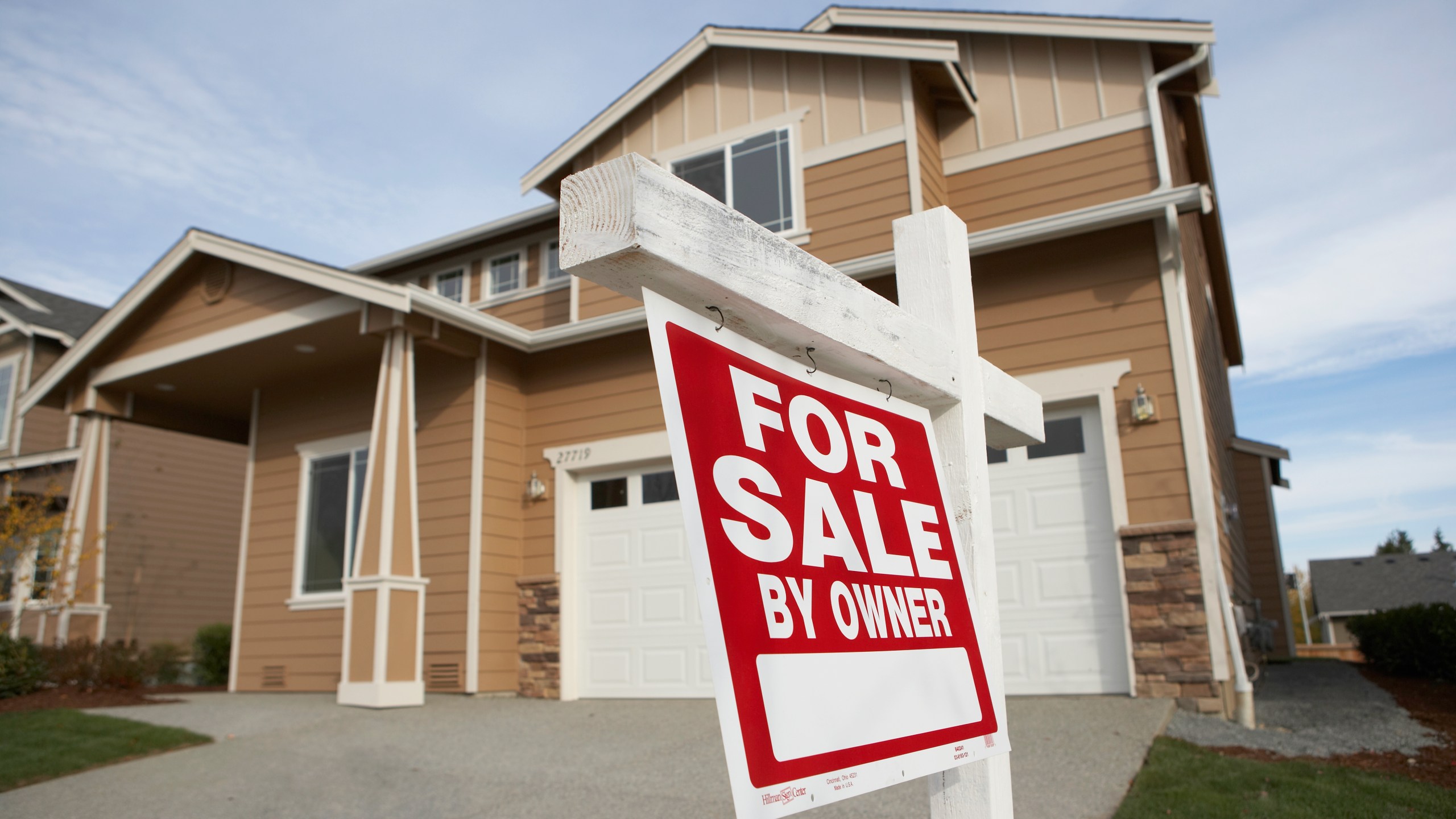 A "for sale" sign is seen outside a home in this undated file photo. (Getty Images)