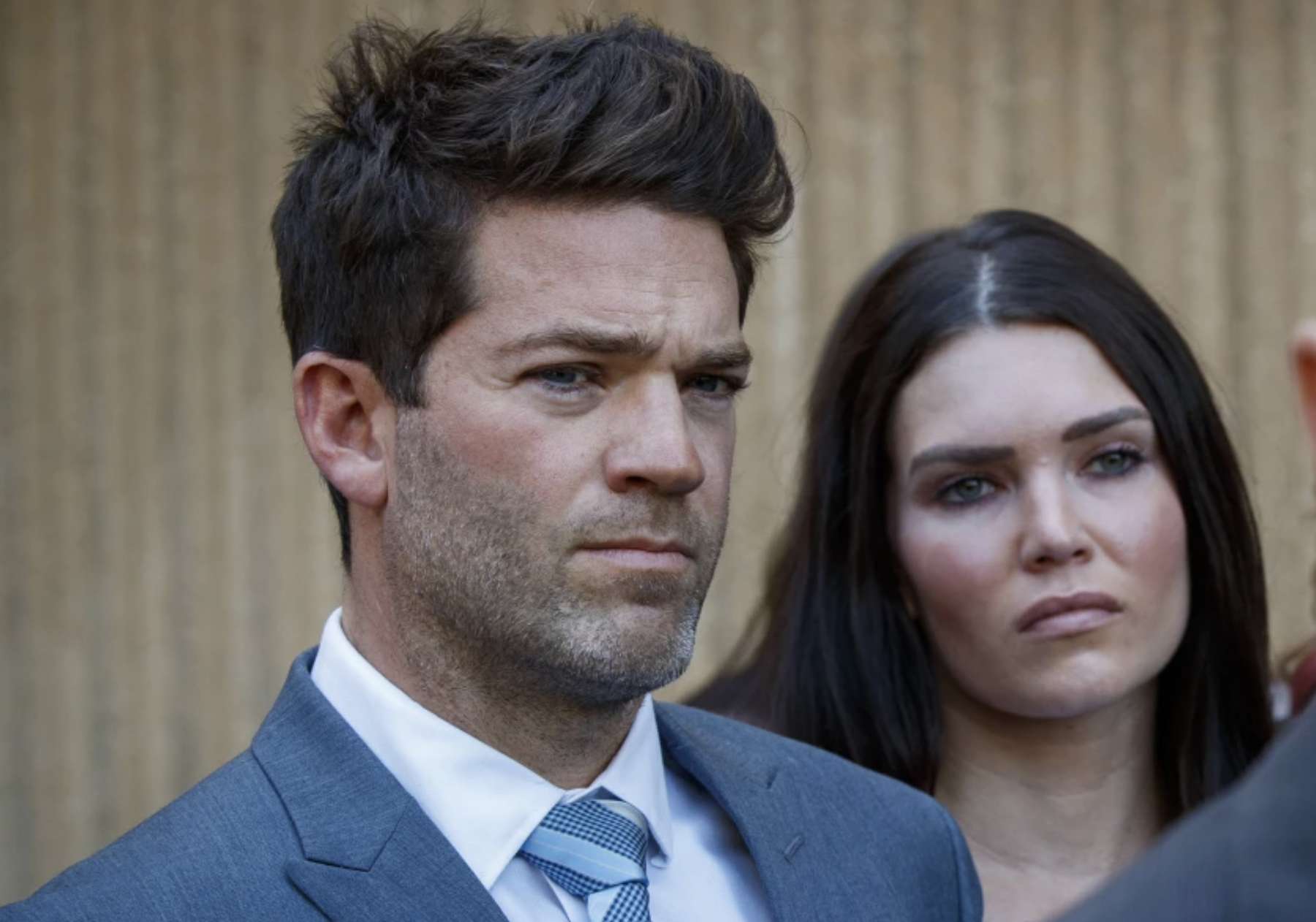 A February 2020 photo shows Newport Beach surgeon Grant Robicheaux and his girlfriend, Cerissa Riley, at the Harbor Justice Center.(Allen J. Schaben / Los Angeles Times)