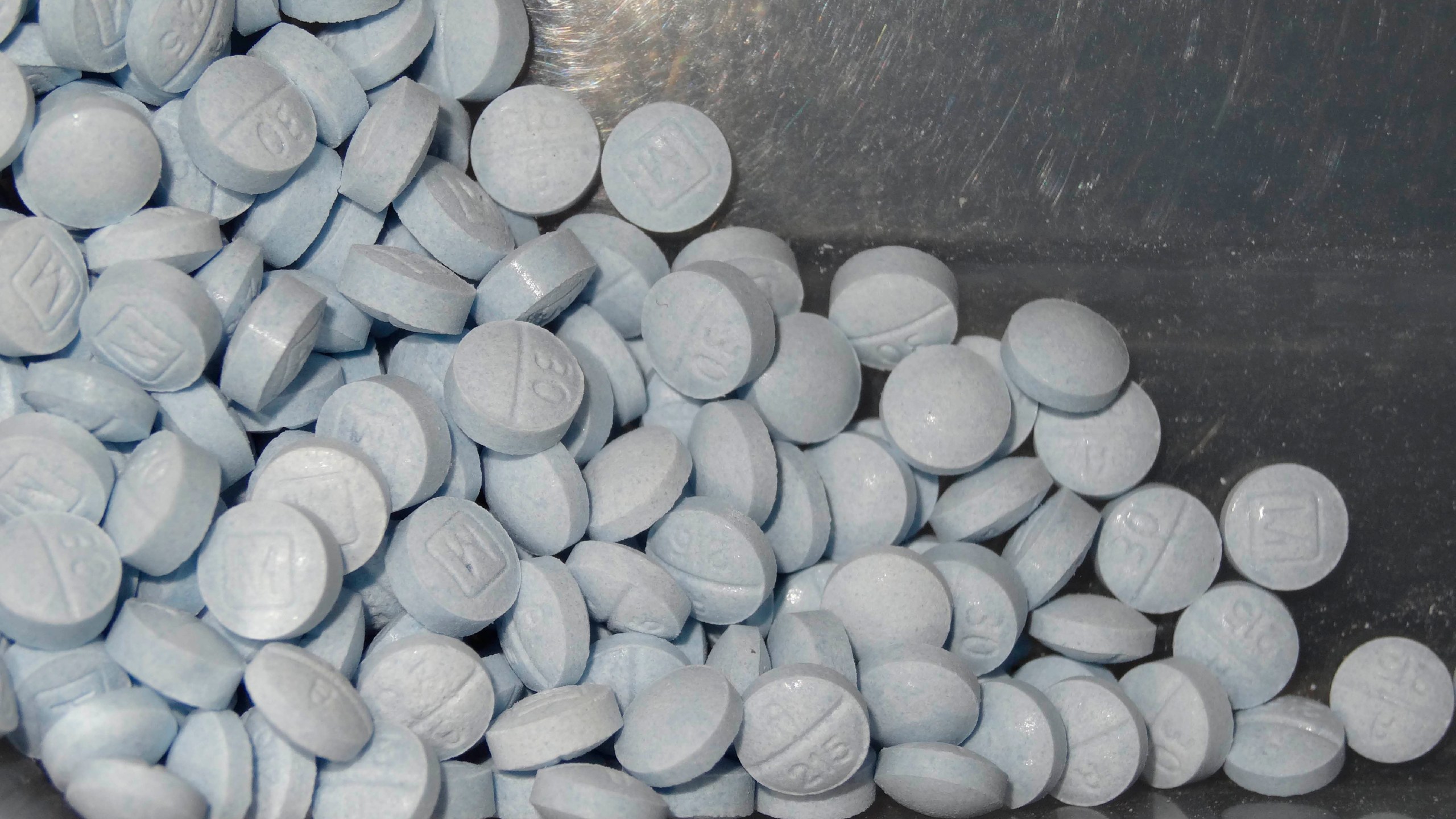 This photo provided by the U.S. Attorneys Office for Utah and introduced as evidence in a 2019 trial shows fentanyl-laced fake oxycodone pills collected during an investigation. (U.S. Attorneys Office for Utah via AP)