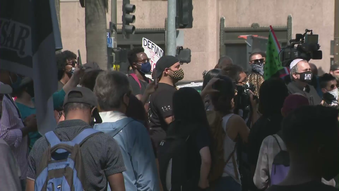 Demonstrators gather in downtown L.A. for a rally marking the anniversary of George Floyd's death on May 25, 2021. (KTLA)