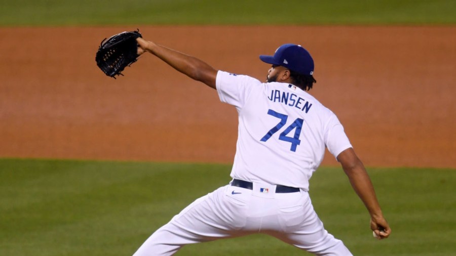 Kenley Jansen #74 of the Los Angeles Dodgers pitches in relief during the eighth inning against the San Diego Padres at Dodger Stadium on April 24, 2021 in Los Angeles, California. (Harry How/Getty Images)