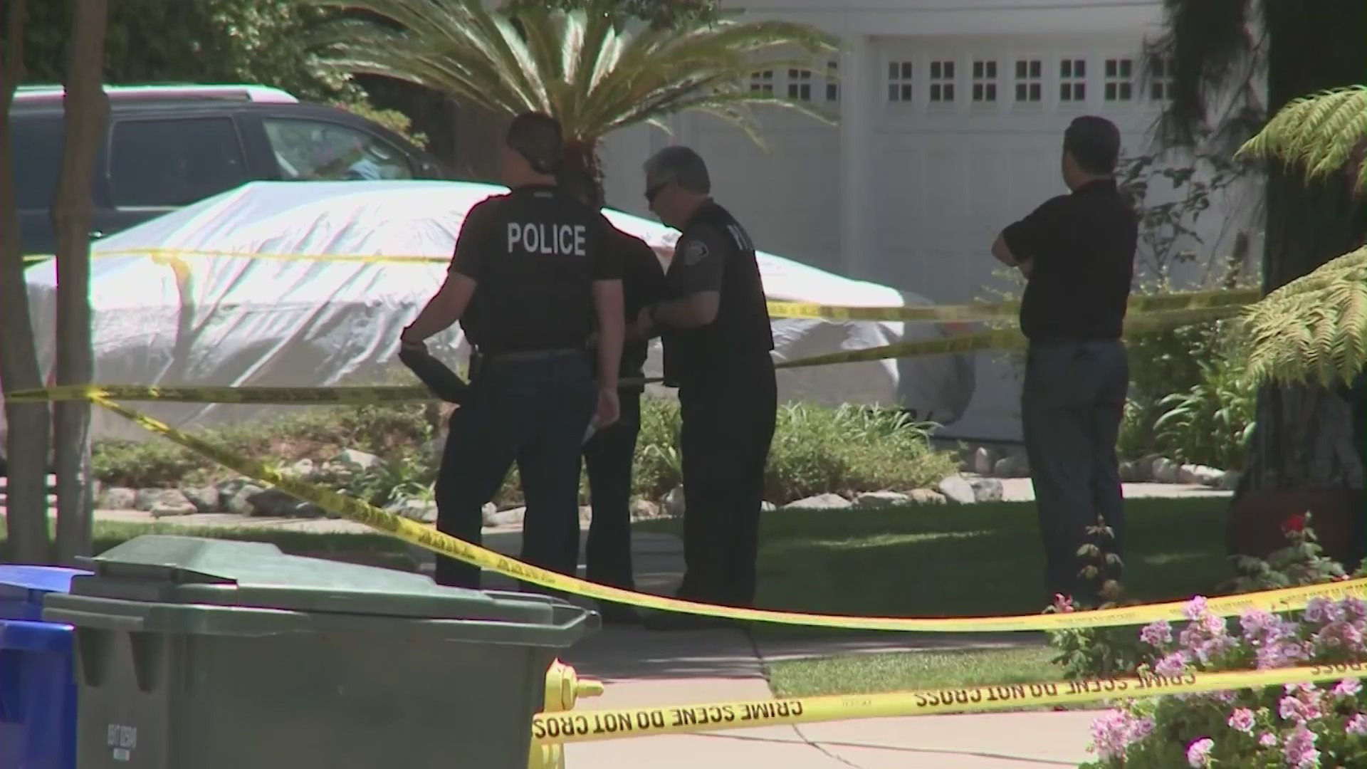 Police investigate at the scene where a woman was fatally stabbed in Upland on May 6, 2021. (KTLA)