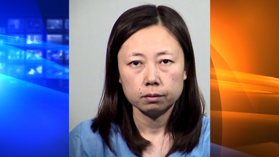 This Saturday, May 15, 2021, booking photo released by Tempe Police Department shows Yui Inoue, 40, who is jailed for allegedly killing her two children in Tempe, Ariz. (Tempe Police Department via AP)