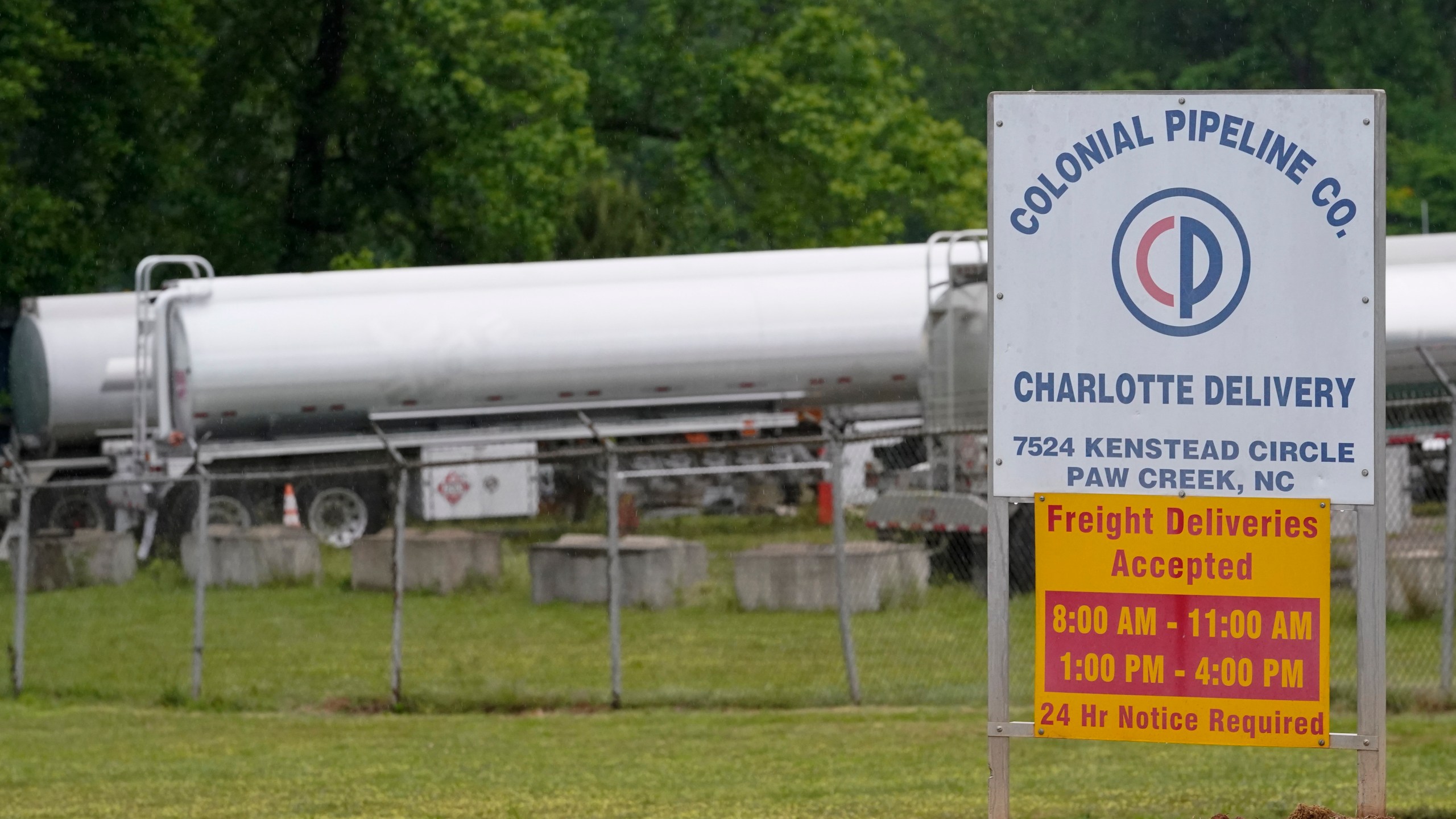 Tanker trucks are parked near the entrance of Colonial Pipeline Company Wednesday, May 12, 2021, in Charlotte, N.C. The operator of the nation’s largest fuel pipeline has confirmed it paid $4.4 million to a gang of hackers who broke into its computer systems. That's according to a report from the Wall Street Journal. Colonial Pipeline’s CEO Joseph Blount told the Journal that he authorized the payment after the ransomware attack because the company didn’t know the extent of the damage. (AP Photo/Chris Carlson)