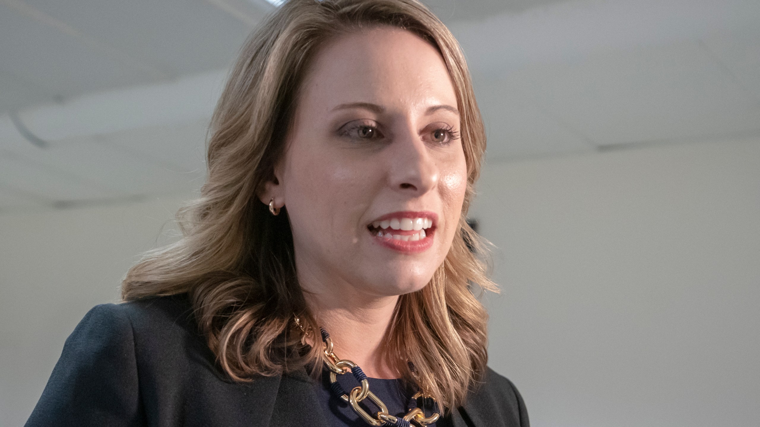 In this April 3, 2019, file photo, then- Rep. Katie Hill, D-Calif., is seen on Capitol Hill in Washington. The former California congresswoman has been ordered to pay about $220,000 in attorneys' fees to a British tabloid and two conservative journalists she sued after the publication of intimate photos without her consent. (AP Photo/J. Scott Applewhite, File)