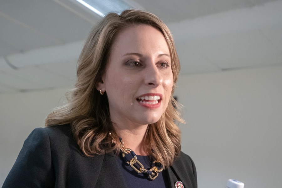 In this April 3, 2019, file photo, then- Rep. Katie Hill, D-Calif., is seen on Capitol Hill in Washington. The former California congresswoman has been ordered to pay about $220,000 in attorneys' fees to a British tabloid and two conservative journalists she sued after the publication of intimate photos without her consent. (AP Photo/J. Scott Applewhite, File)