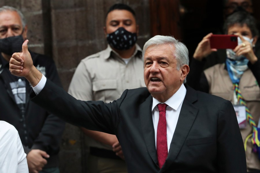 Mexico's President Andrés Manuel López Obrador thumbs up after voting in congressional, state and local elections in Mexico City, Sunday, June 6, 2021. Mexicans on Sunday were electing the entire lower house of Congress, almost half the country's governors and most mayors in a vote that will determine if Obrador's Morena party gets the legislative majority. (AP Photo/Marco Ugarte)