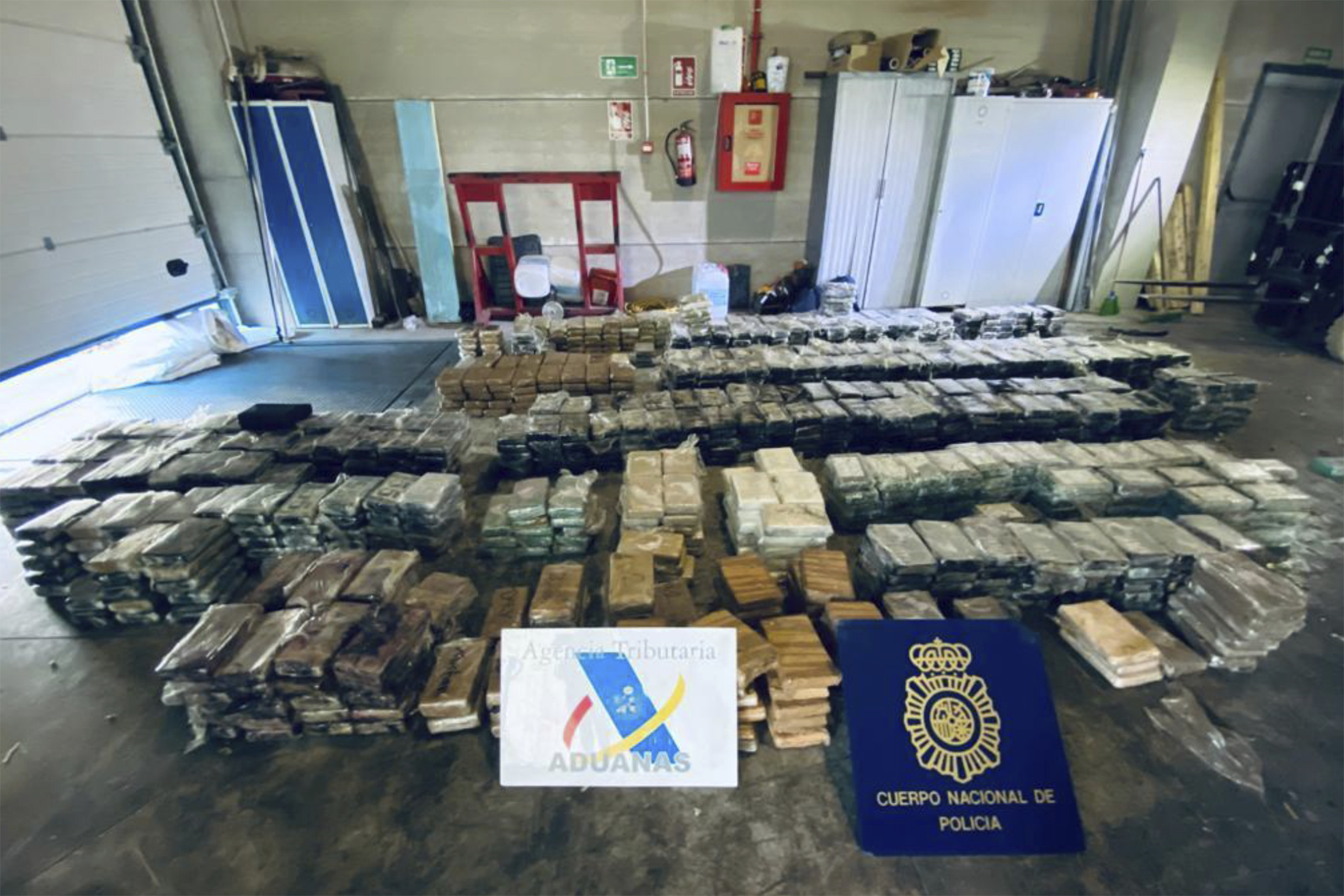 This May 2021 image from an affidavit for a search warrant, provided by the U.S. Department of Justice, shows cocaine that had been transported in hollowed-out pineapples from Costa Rica to Spain. Law enforcement agencies learned about the shipment as part of a global sting operation unveiled Tuesday, June 8, 2021, that intercepted text messages criminals thought were secure. Authorities they said dealt an “unprecedented blow” to organized crime in countries around the world. (Department of Justice via AP)