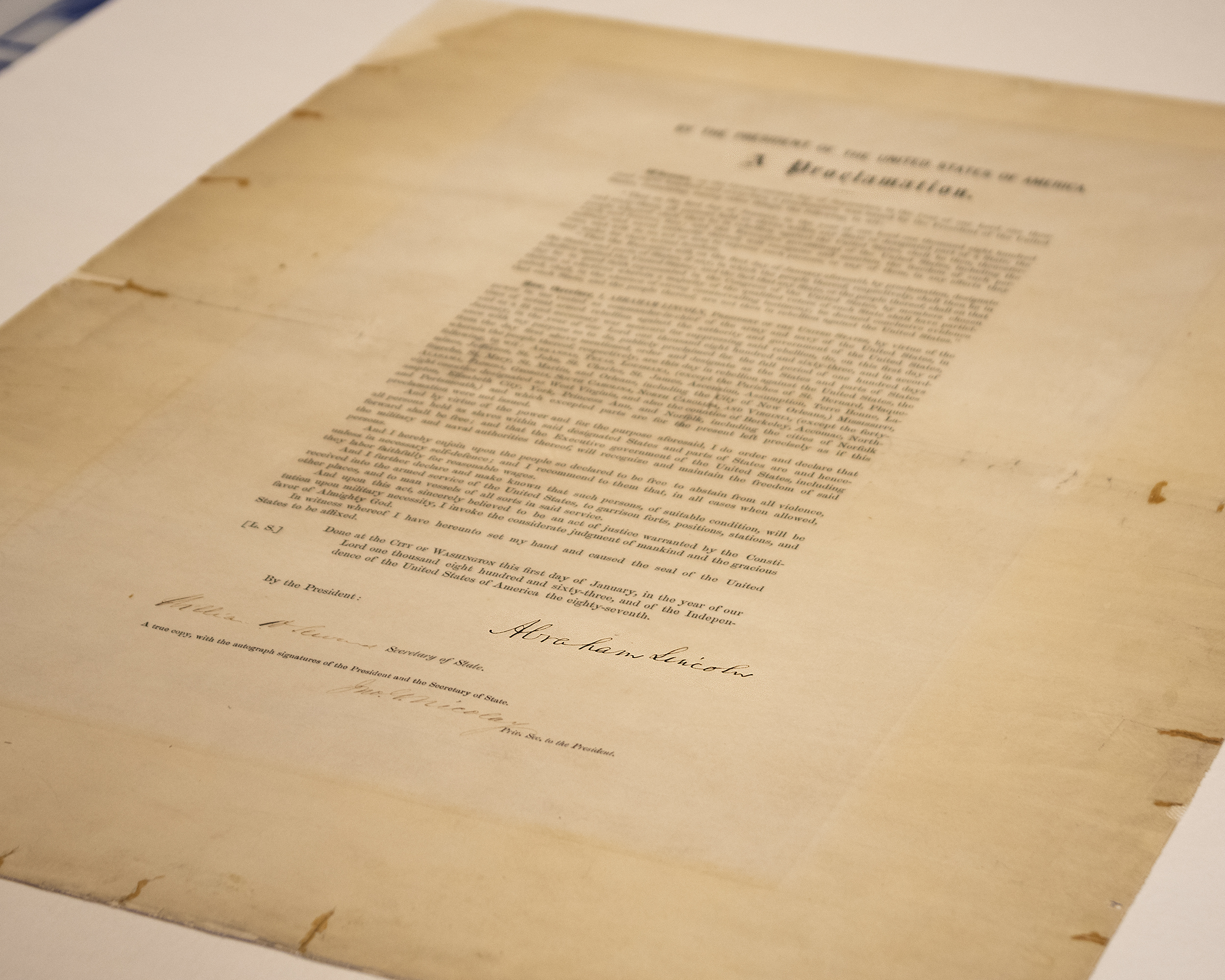 This updated handout photo provided by the Abraham Lincoln Presidential Library and Museum on Tuesday, June 8, 2021 shows a signed copy of Emancipation Proclamation. The Library, in Springfield, Ill., will mark Juneteenth, the holiday commemorating the end of slavery in the United States, by displaying the rare signed copy of the Emancipation Proclamation. The copy of the proclamation that's signed by Lincoln and Secretary of State William Seward will be displayed between June 15 and July 6. The original document is kept in the National Archives in Washington, D.C. (Abraham Lincoln Presidential Library and Museum photo via AP)