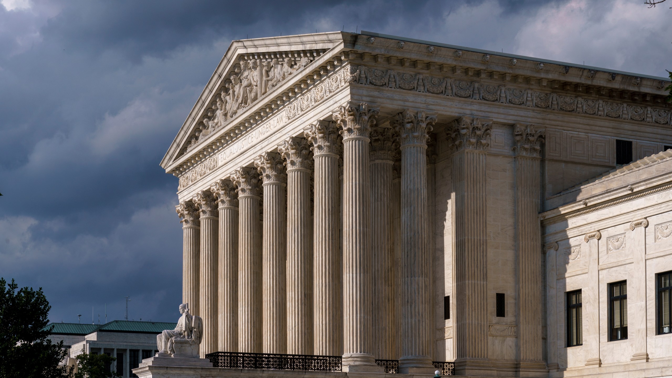 In this June 8, 2021 photo, the Supreme Court is seen in Washington. (AP Photo/J. Scott Applewhite)