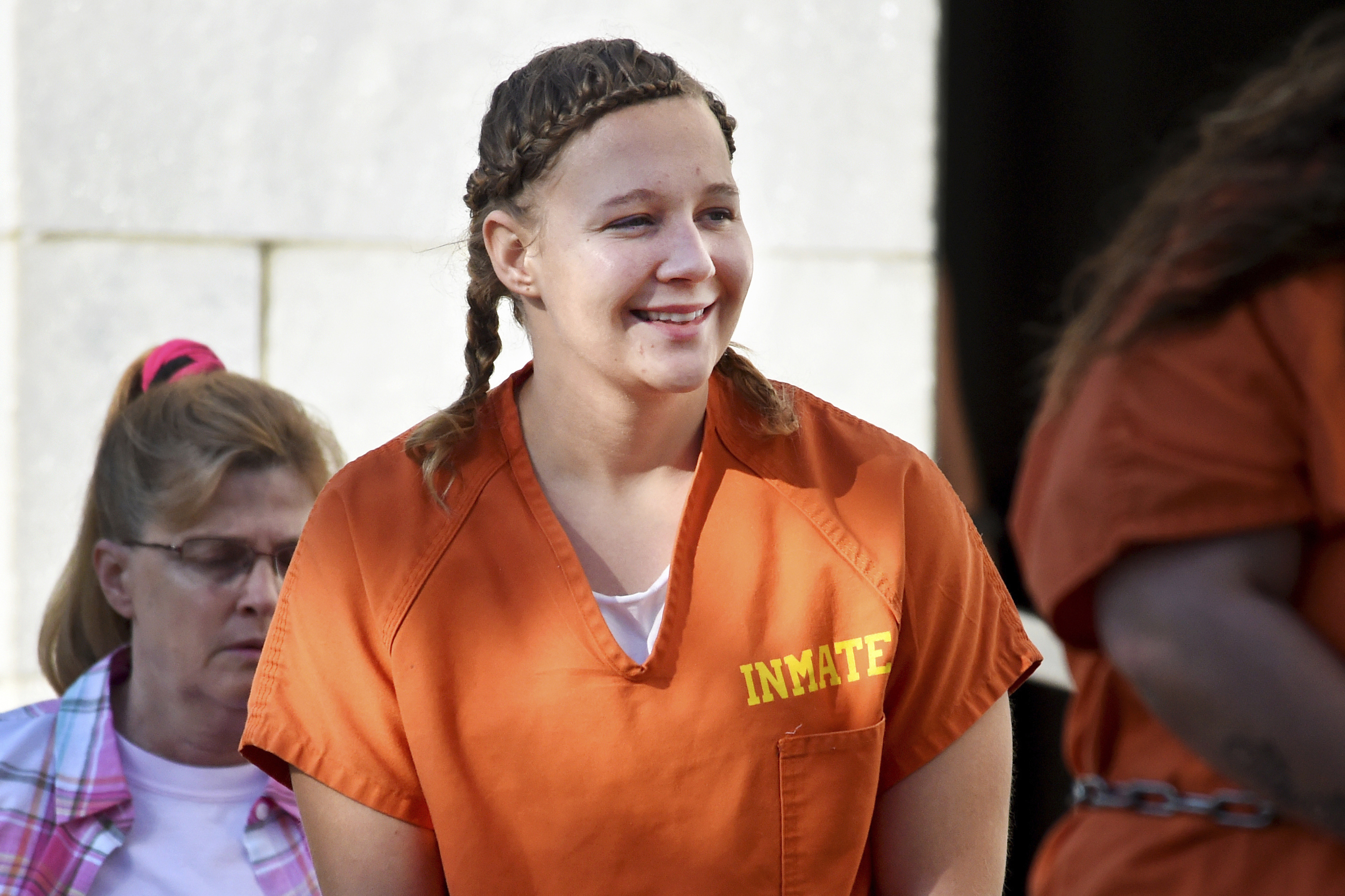 In this June 26, 2018 file photo, Reality Winner walks into the Federal Courthouse in Augusta, Ga. Winner, 29, a former government contractor who was given the longest federal prison sentence imposed for leaks to the news media, has been released from prison to home confinement, a person familiar with the matter told The Associated Press on Monday. (Michael Holahan/The Augusta Chronicle via AP, File)