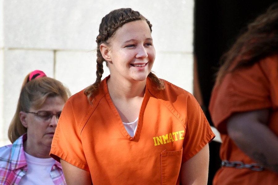 In this June 26, 2018 file photo, Reality Winner walks into the Federal Courthouse in Augusta, Ga. Winner, 29, a former government contractor who was given the longest federal prison sentence imposed for leaks to the news media, has been released from prison to home confinement, a person familiar with the matter told The Associated Press on Monday. (Michael Holahan/The Augusta Chronicle via AP, File)