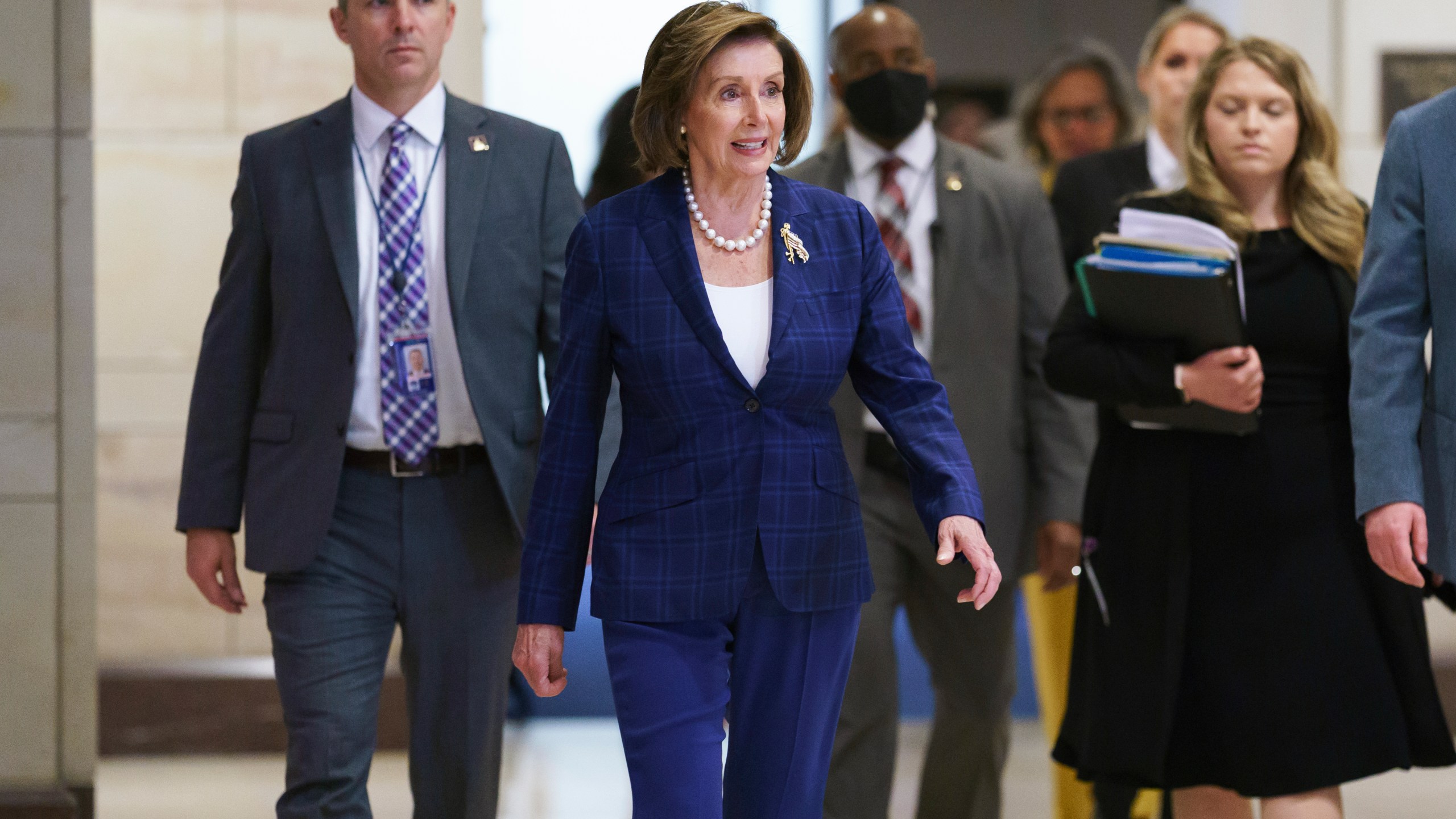 Speaker Nancy Pelosi says the House will move forward with investigations of the Jan. 6 insurrection now that legislation to create an independent commission has stalled in the Senate, saying “we can't wait any longer" to probe the attack. Pelosi's comments came as the House heard testimony Tuesday from military officials and FBI Director Christopher Wray about what went wrong that day, when hundreds of supporters of former President Donald Trump breached the Capitol and interrupted the certification of President Joe Biden's win. Pelosi met with several committee chairs before the hearing and said afterward that the final form of the investigations is “to be determined." She said she will make an announcement soon. “Whether we have a commission today, tomorrow or the next day over in the Senate, or not, the work of the committees will be very important in what we're seeking for the American people — the truth,” Pelosi said. One option under consideration is a select committee on the Jan. 6 attack, a setup that would put majority Democrats in charge. More than three dozen Republicans in the House and seven Senate Republicans wanted to avoid such a partisan probe and supported the legislation to create an independent, bipartisan commission outside Congress. But those numbers weren't strong enough to overcome GOP opposition in the Senate, where support from 1O Republicans is needed to pass most bills. Senate Democratic leader Chuck Schumer has said he may hold a second vote after the legislation failed to advance last month, but there's no indication that Democrats can win the necessary support from three additional Republicans. “We can't wait any longer,” Pelosi said. “We will proceed." Meanwhile, most Republicans are making clear that they want to move on from the Jan. 6 attack, brushing aside the many unanswered questions about the insurrection, including how the government and law enforcement missed intelligence leading up to the rioting and the role of Trump before and during the attack. The hearing Tuesday in the House Oversight and Reform Committee was to examine “unexplained delays and unanswered questions” about the siege, with public testimony from Wray, Gen. Charles E. Flynn and Lt. Gen. Walter E. Piatt, the director of Army staff. All three men were involved that day as the Capitol Police begged for backup. The National Guard did not arrive for several hours as the police were overwhelmed and brutally beaten by the rioters. Echoing previous testimony from Defense Department leaders, Flynn and Piatt said the military needed time to develop plans for the National Guard response. Piatt insisted that he did not deny or have the authority to deny Guard help during a call with former Capitol Police Chief Steven Sund. Rep. Carolyn Maloney, the New York Democrat who chairs the committee, criticized Wray for not providing documents her staff had requested and asked him if he believed the FBI should be blamed for the law enforcement failures on Jan. 6. “Our goal is to bat 1.000 and any time there’s an attack, much less an attack as horrific and spectacular as what happened on Jan. 6, we consider that to be unacceptable," Wray replied. Seven people died during and after the rioting, including a Trump supporter who was shot and killed as she tried to break into the House chamber and two police officers who died by suicide in the days that followed. A third officer, Capitol Police Officer Brian Sicknick, collapsed and later died after engaging with the protesters, but a medical examiner determined he died of natural causes.