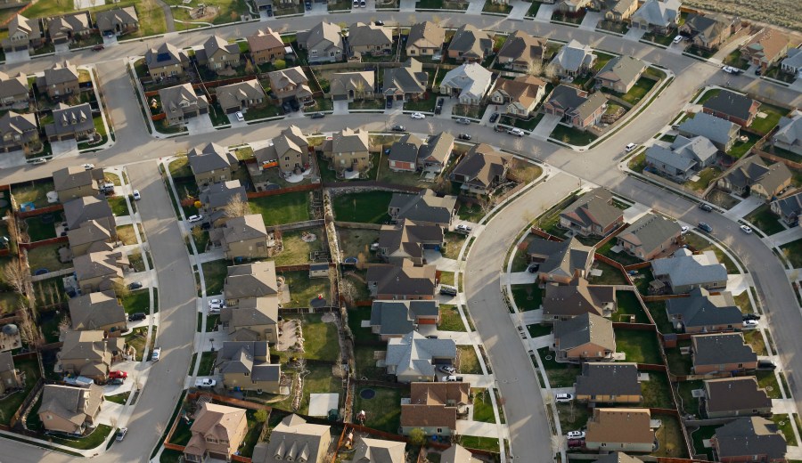 This April 13, 2019, file photo, shows homes in suburban Salt Lake City. (AP Photo/Rick Bowmer, File)