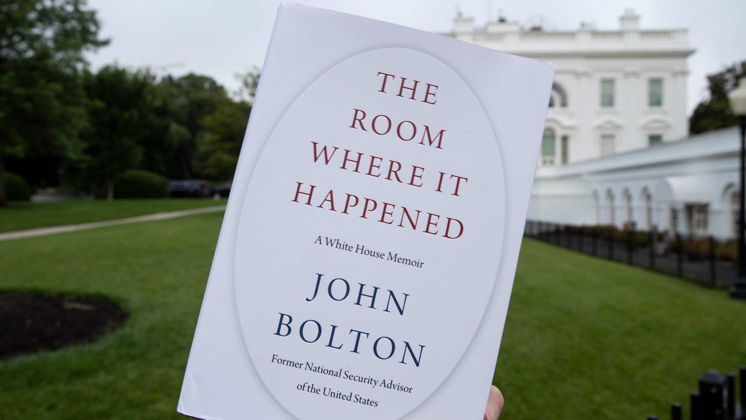 This June 18, 2020, file photo shows a copy of "The Room Where It Happened" by former national security adviser John Bolton. (Alex Brandon/Associated Press)