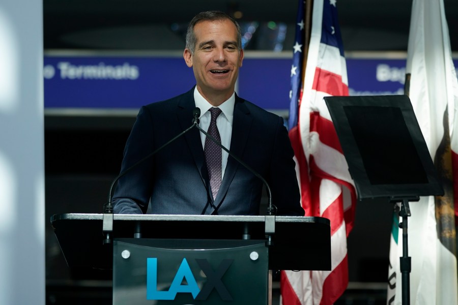 In this May 24, 2021 file photo Los Angeles Mayor Eric Garcetti speaks a press conference at Los Angeles International Airport, in Los Angeles.(AP Photo/Ashley Landis, File)