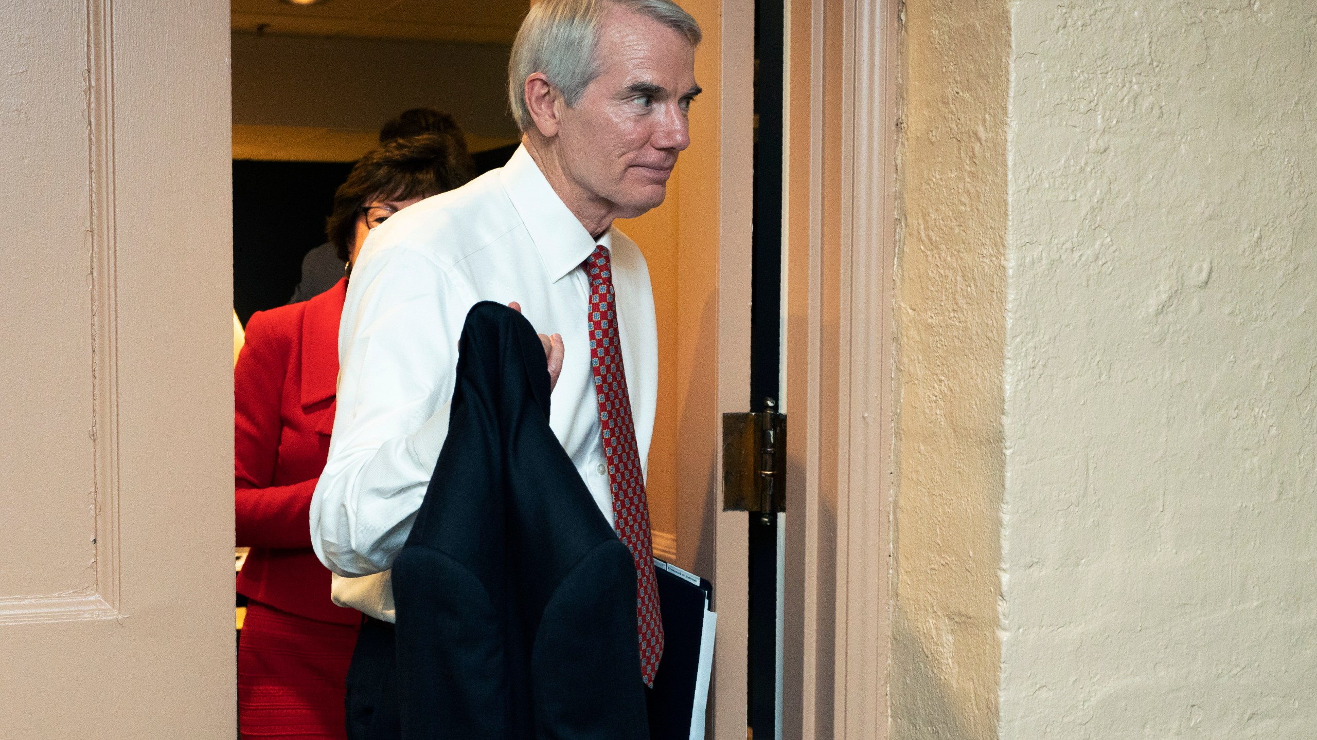 Sen. Rob Portman, R-Ohio, leaves a closed-door bipartisan infrastructure meeting with a group of senators and White House aides on Capitol Hill in Washington on June 22, 2021. (AP Photo/Manuel Balce Ceneta)