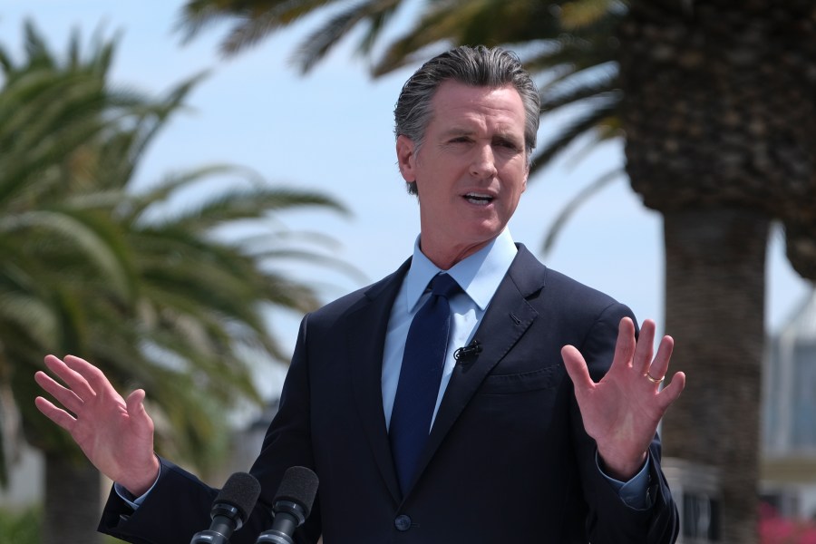 California Gov. Gavin Newsom talks during a news conference at Universal Studios Hollywood on June 25, 2021. (Ringo H.W. Chiu / Associated Press)