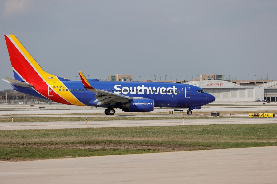 A Southwest Airlines Boeing 737-700 jet taxis to the gate after landing at Midway International Airport in Chicago, Illinois, on April 6, 2021. (Photo by KAMIL KRZACZYNSKI / AFP) (Photo by KAMIL KRZACZYNSKI/AFP via Getty Images)