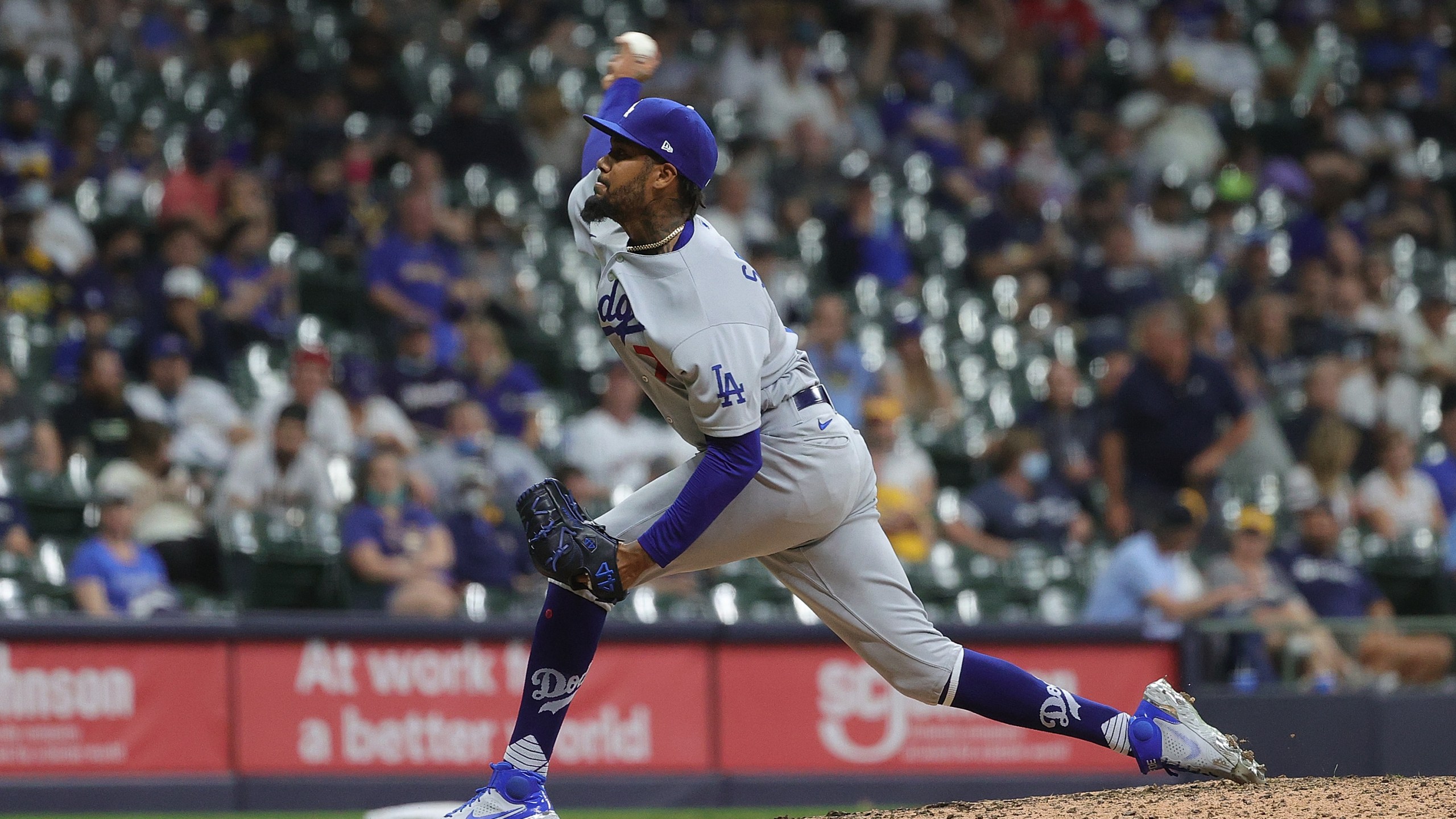 Dennis Santana of the Los Angeles Dodgers throws a pitch during the sixth inning against the Milwaukee Brewers at American Family Field on May 1, 2021 in Milwaukee. (Stacy Revere/Getty Images)