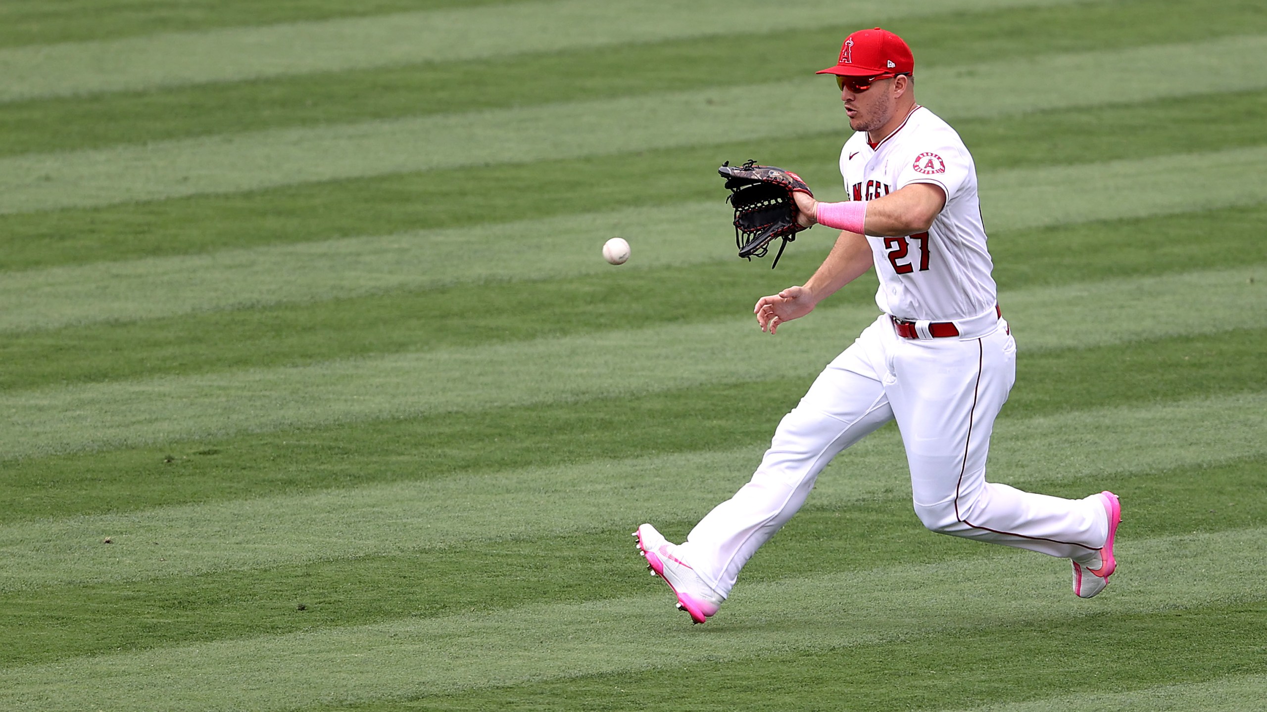 Mike Trout #27 of the Los Angeles Angels fields a fly ball on May 9, 2021. (Photo by Sean M. Haffey/Getty Images)