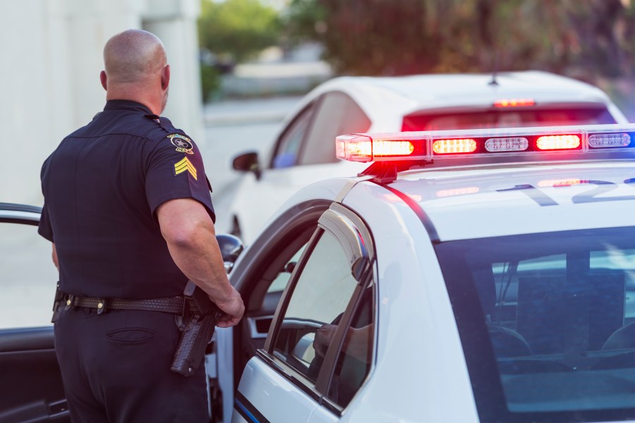 This file photo shows a police officer pulling over a driver. (Getty Images)