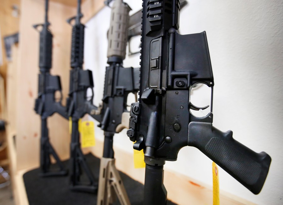 AR-15 semi-automatic guns are on display for sale at on June 17, 2016 in Springville, Utah. (George Frey/Getty Images)