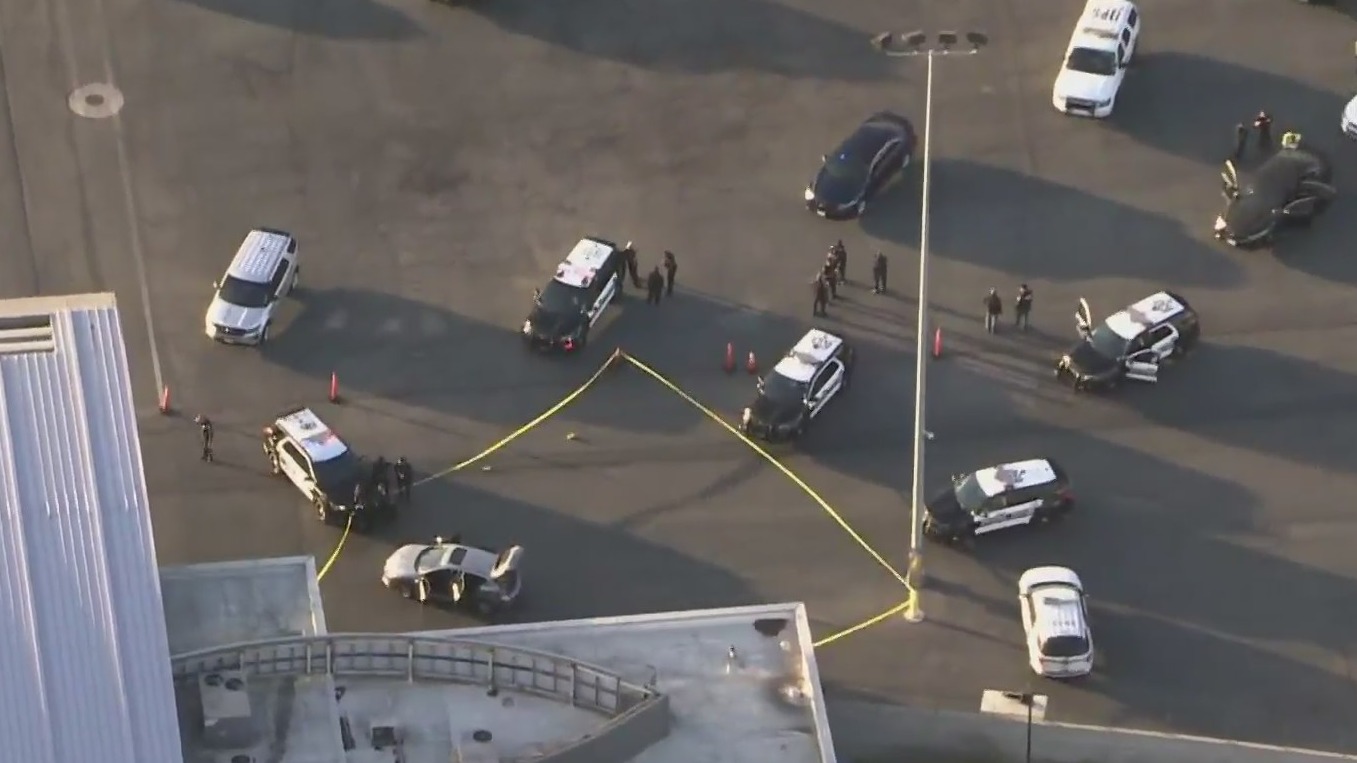 Authorities respond to investigate after a driver broke through a fence at a FedEx cargo facility at the Los Angeles International Airport on June 24, 2021. (KTLA)