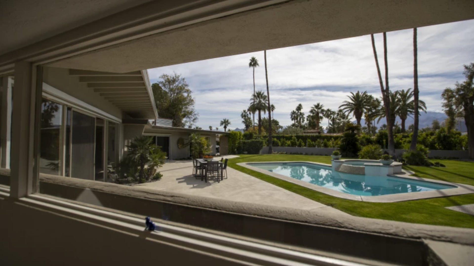 A view of the swimming pool at the Lawrence Welk estate in Palm Springs. The city matched its all-time record of 123 degrees Thursday. (Allen J. Schaben / Los Angeles Times)