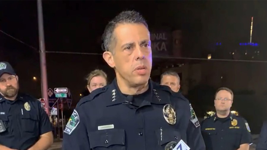 This photo provided by Austin Police Department shows Chief Chacon providing an update on overnight shootings in Austin, Texas, early Saturday, June 12, 2021. Chacon says gunfire erupted in a busy entertainment district downtown early Saturday injuring several. (Austin Police Department via AP)