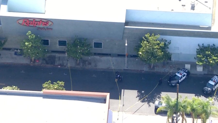 Police respond to investigate a shooting outside a Ralphs in the Mid-Wilshire neighborhood of Los Angeles on June 23, 2021. (KTLA)