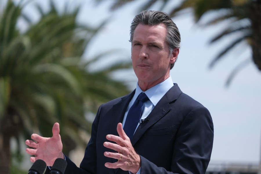 California Governor Gavin Newsom talks during a news conference at Universal Studios in Universal City, Calif., on Tuesday, June 15, 2021. (AP Photo/Ringo H.W. Chiu)