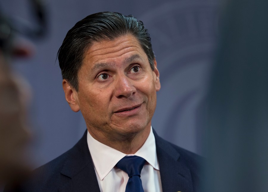 Eloy Ortiz Oakley talks to reporters after he was named chancellor of the California Community Colleges on July 18, 2016, in Sacramento. (Rich Pedroncelli/Associated Press)