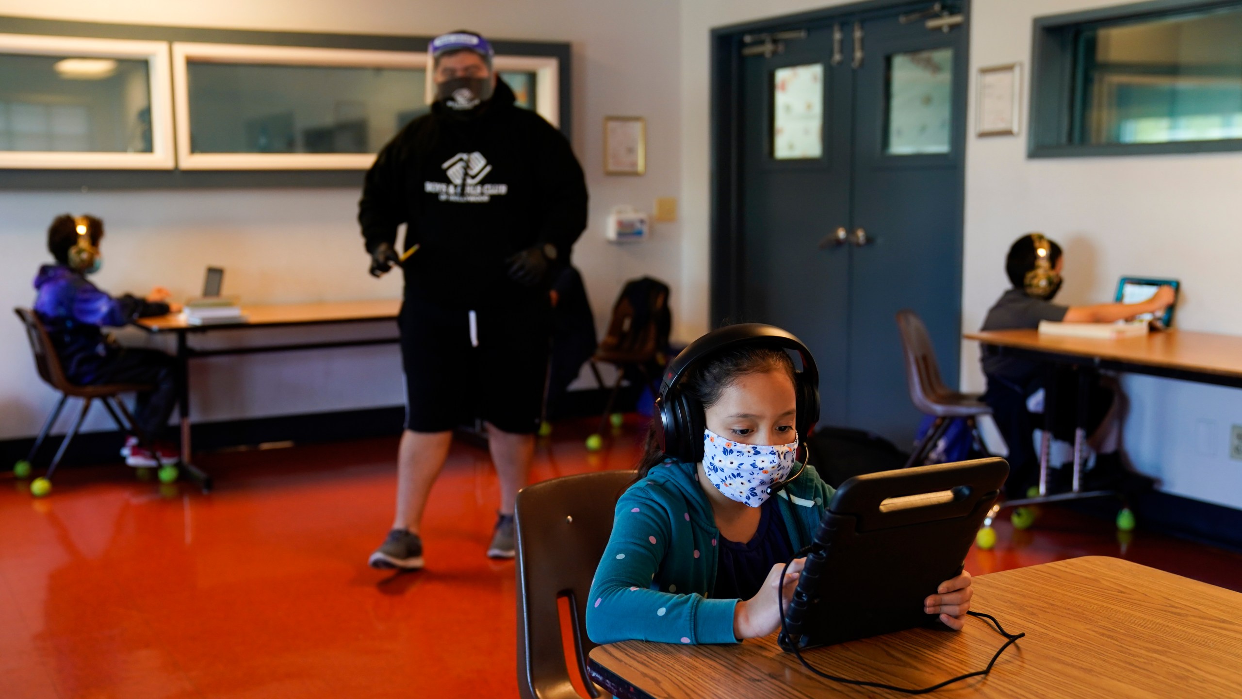 Los Angeles Unified School District students attend online classes at the Boys & Girls Club of Hollywood on Aug. 26, 2020. (Jae C. Hong / Associated Press)