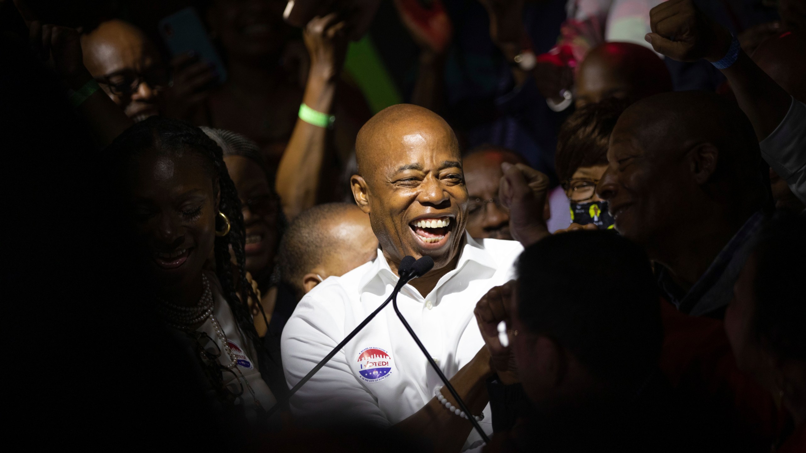 Mayoral candidate Eric Adams mingles with supporters during his election night party on June 22, 2021, in New York. (Kevin Hagen / Associated Press)