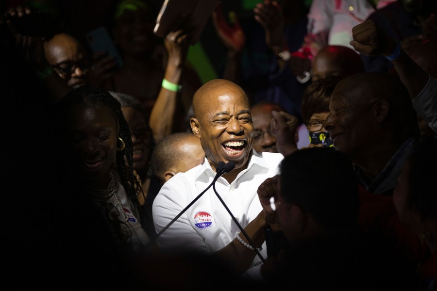 Mayoral candidate Eric Adams mingles with supporters during his election night party on June 22, 2021, in New York. (Kevin Hagen / Associated Press)