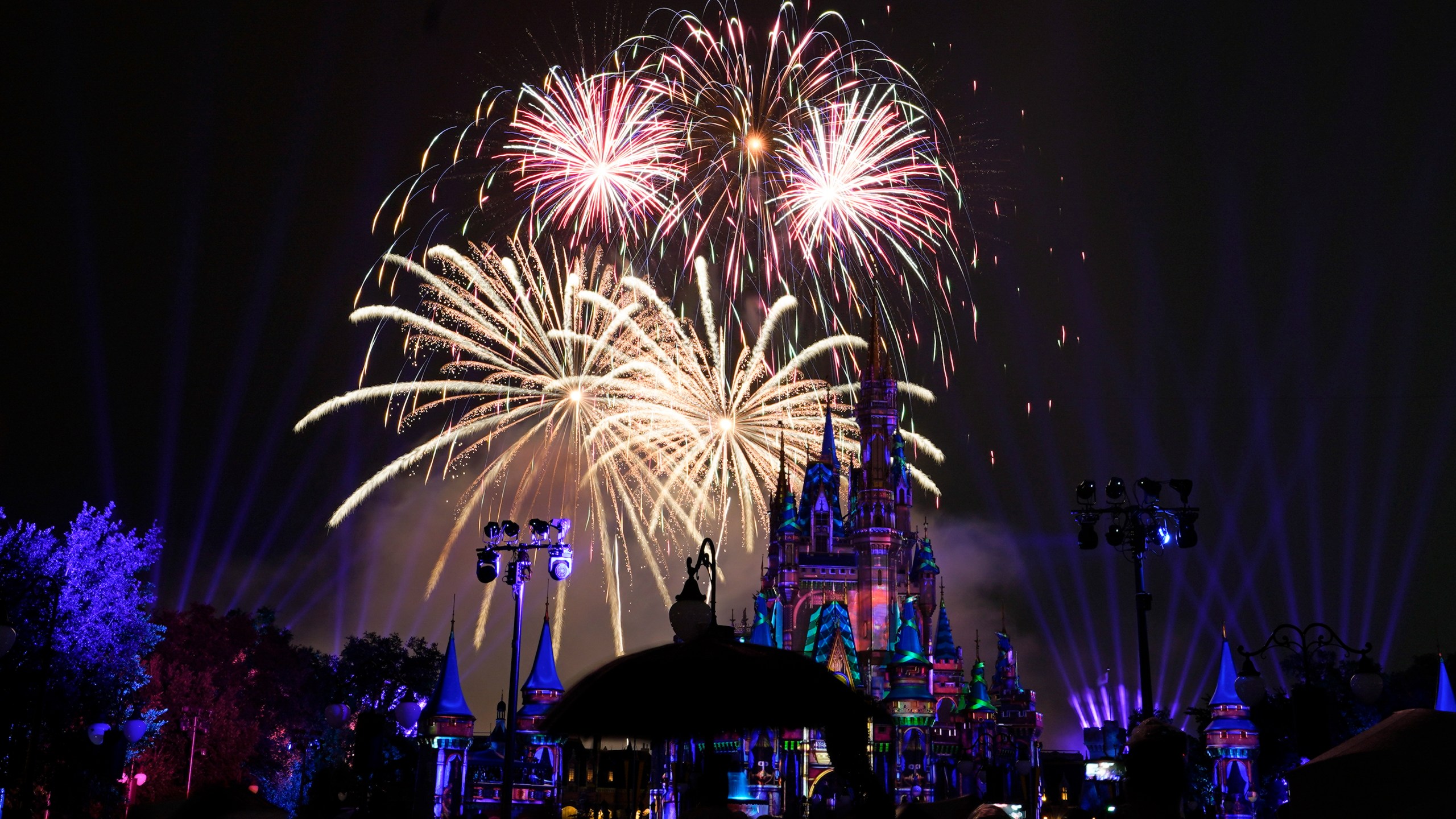 After a shutdown because of the coronavirus, fireworks fill the sky for the first time in 15 months at the Magic Kingdom at Walt Disney World in Lake Buena Vista, Fla., on July 1, 2021. (John Raoux / Associated Press)