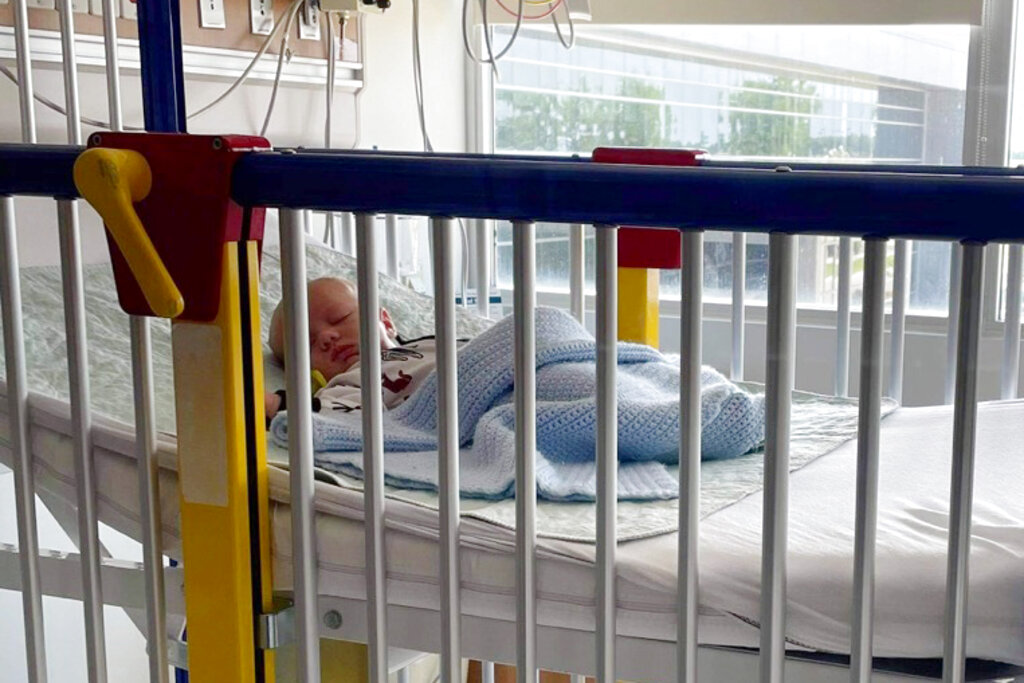 In this June 2021 photo provided by LaRanda St. John, her 6-week-old son, Beau, lies in a hospital bed at the Sarah Bush Lincoln Health Center in Matoon, Ill. (LaRanda St. John via AP)