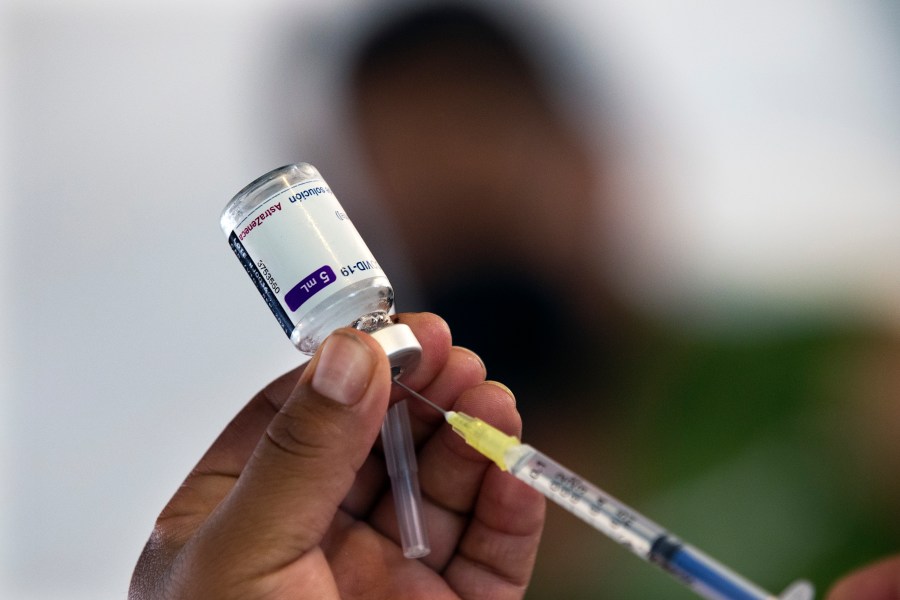 A health worker prepares to administer a jab of the AstraZeneca COVID-19 vaccine during a vaccination drive for people ages 30 to 39 in Mexico City, July 7, 2021. (Marco Ugarte/Associated Press)